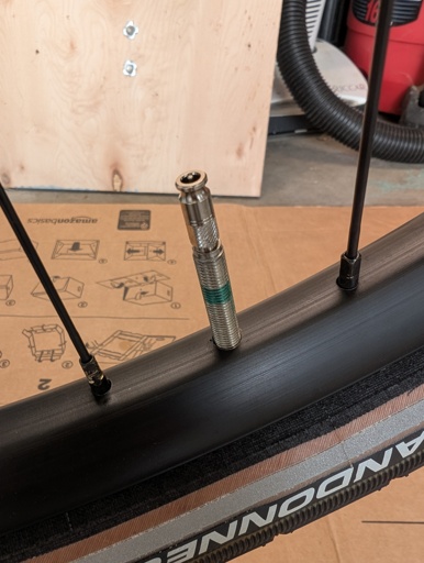 Clik valve installed on a bicycle wheel